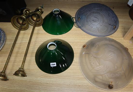 Two glass plaffoniers and two hanging green glass lamps